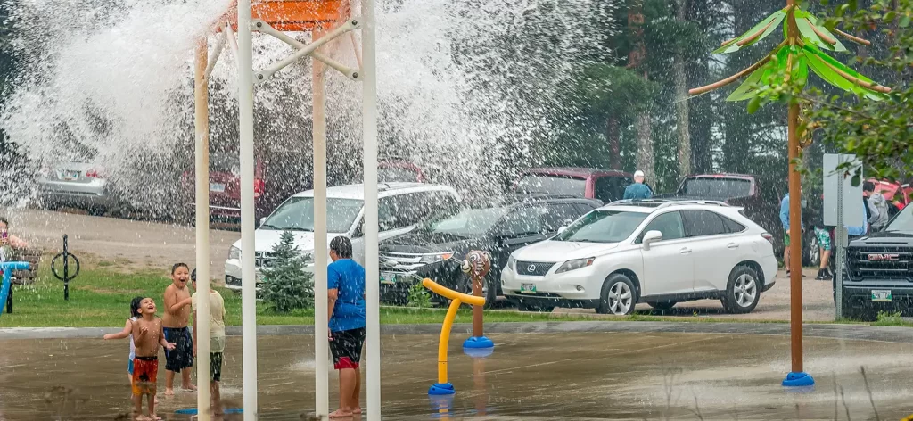 Kids playing at the Norman splash park.